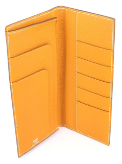 Portefeuille HERMES EVELYN en cuir jaune orangé