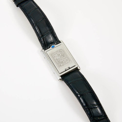 Montre TANK basculante CARTIER acier