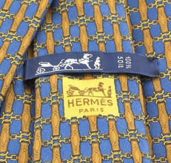 Cravate HERMES en soie imprimé bleu et marron