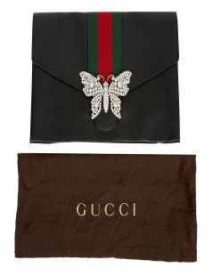 Serviette GUCCI cuir grainé et broche papillon