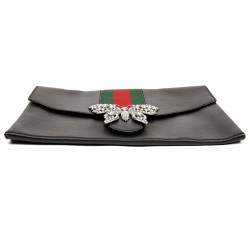 Gucci grained leather pouch and butterfly brooch