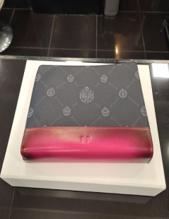 Pochette Nino BERLUTI en toile et cuir rose