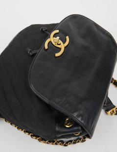 Sac a dos vintage CHANEL en toile et cuir bleu marine