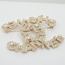 CHANEL Large CC Brooch in Gilt Metal, Pearls and Rhinestones