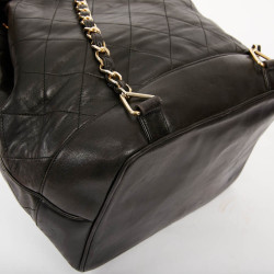 Sac à dos CHANEL vintage en cuir noir