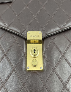 CHANEL Vintage Briefcase in brown quilted lamb leather.