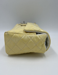 CHANEL Vertical Timeless bag in yellow patent leather