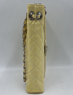 CHANEL Vertical Timeless bag in yellow patent leather