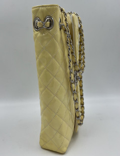 CHANEL Vertical Timeless bag in yellow patent leather