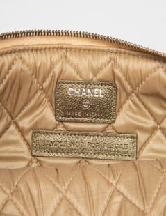 Pochette CHANEL poils brillants dorés 