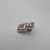 Pin's CHANEL bouteille nacrée