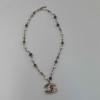 Collier CHANEL perle nacree parme