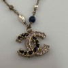 Collier CHANEL perle nacree parme