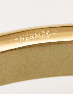 Boucle HERMES guillochée dorée