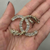 Broche CHANEL strass tête de dragon