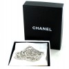 Broche camélia CHANEL