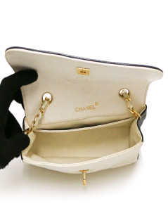 Sac CHANEL noir et blanc vintage