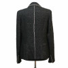 Veste CHANEL T 38 tweed noir et chaine argent