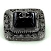 BROCHE CHANEL cabochon noir