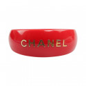 CHANEL red resin and gold inscription bracelet