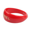 CHANEL red resin and gold inscription bracelet