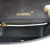 Petit sac vintage CHANEL noir gansé de blanc