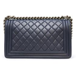 Boy CHANEL cuir d'agneau bleu