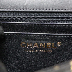 Sac CHANEL  imitation crocodile noir peint c h a n e l doré