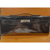 HERMES Kelly cut black Porosus crocodile