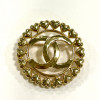 Broche CHANEL ronde dorée 