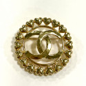 Broche Chanel coeurs ronde dorée 