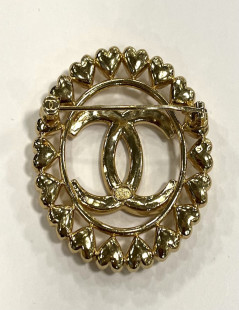 Broche CHANEL ronde dorée 