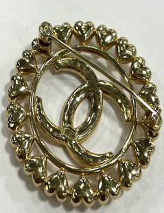 Broche CHANEL ronde dorée 