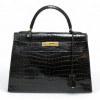 Kelly 32 HERMES Porosus noir Vintage