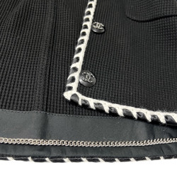 Veste CHANEL T 36 noire gansée blanc