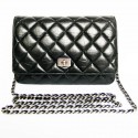 Mini black quilted CHANEL bag