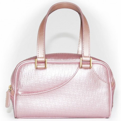 Petit sac CHRISTIAN DIOR en cuir verni rose monogrammée