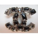 Broche CHANEL cabochons noirs