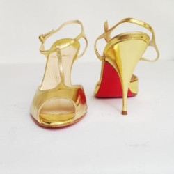 Sandales hautes dorées CHRISTIAN LOUBOUTIN T38,5