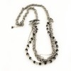 Sautoir CHANEL argent vieilli et strass et perles noires