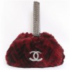 Sac manchon CHANEL fourrure rouge