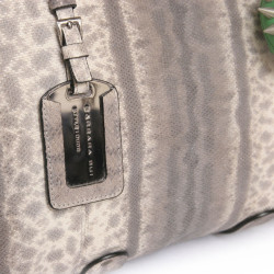 Sac BARBARA BUI en python avec un  charm fétiche vert