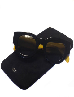 Lunettes de soleil CELINE noires et jaunes