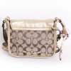 COACH gold leather and monogram canvas bag