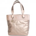 CHANEL "Biarritz" golden bronze coated canvas bag and pink beige