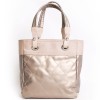 CHANEL "Biarritz" golden bronze coated canvas bag and pink beige