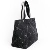 CHANEL black and white "line travel" tote bag