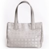 Sac CHANEL en toile argent "ligne voyage"