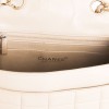 Sac CHANEL en cuir beige et vernis noir vintage