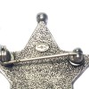 Broche Collection "Paris-Dallas" CHANEL étoile de Sheriff 